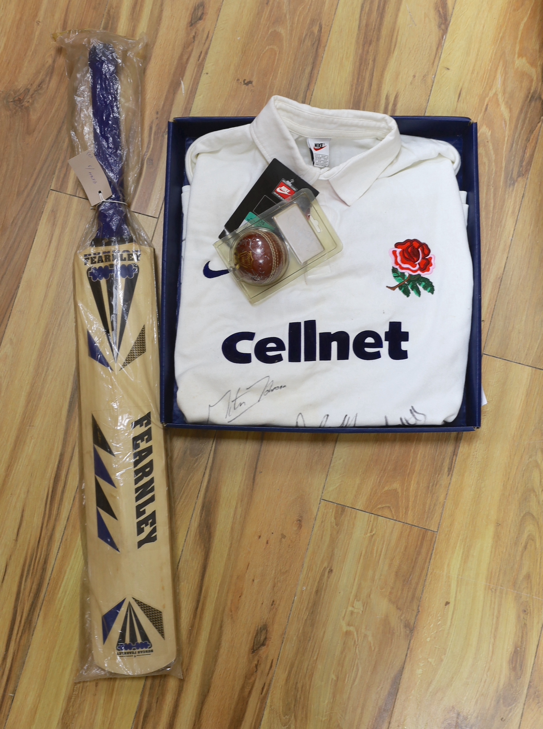 An autographed England rugby shirt, a similar England -v- South Africa 1998 Test Series cricket bat and a cricket ball